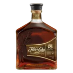 Vue face de la bouteille du rhum Flor de Caña Centenario 18 ans, grand spiritueux premium disponible chez A La Civette.